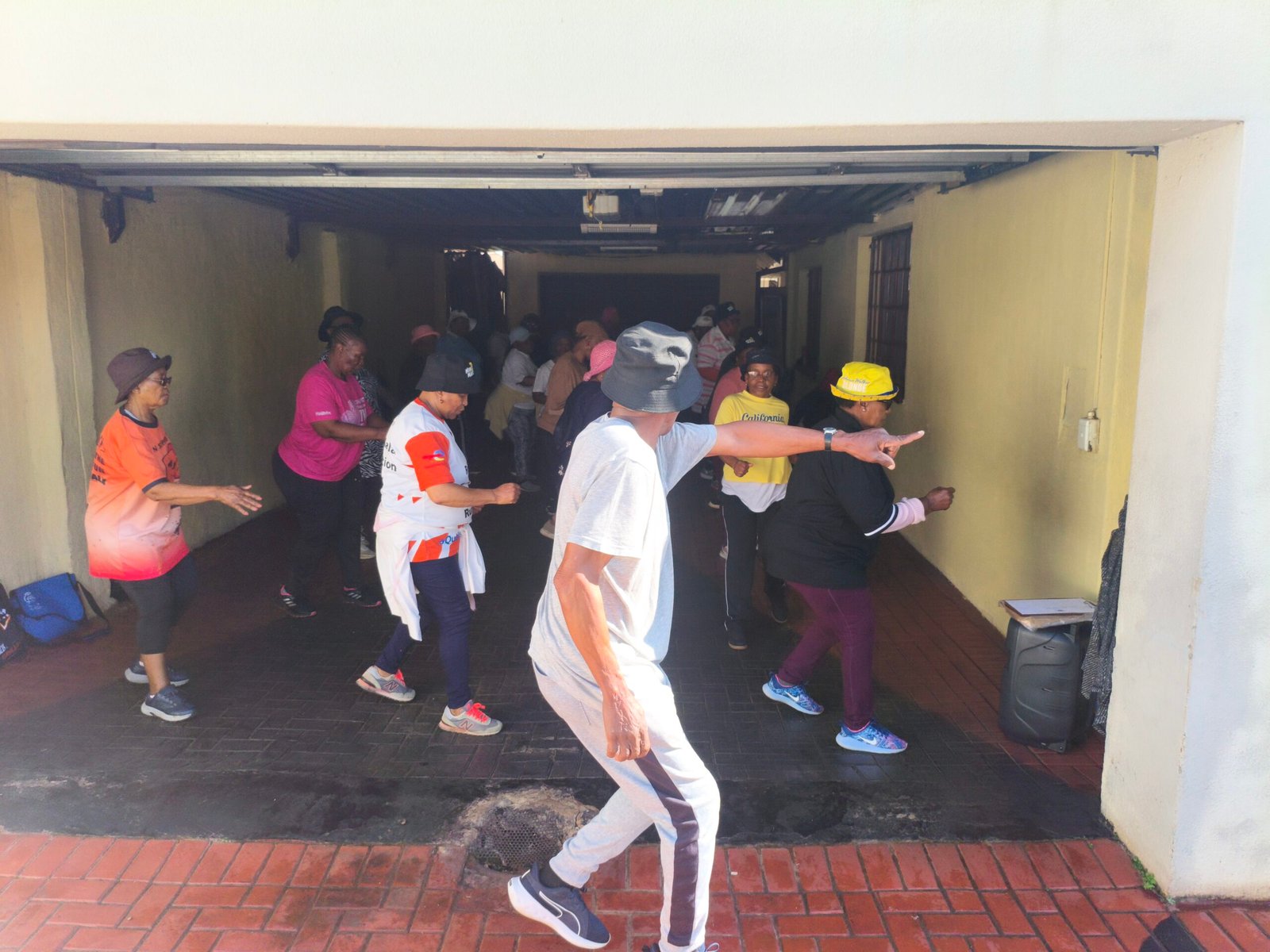 Fitness instructor Tuna Sapula leading Tshepo Ya Sechaba members during an exercise session in Dawn Park.